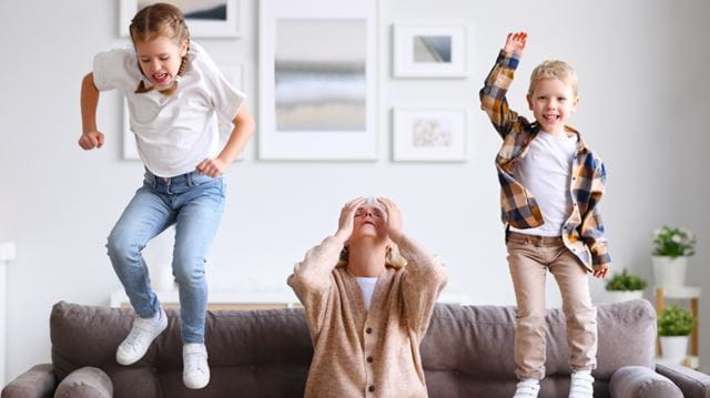 Exasperated grandmother with children